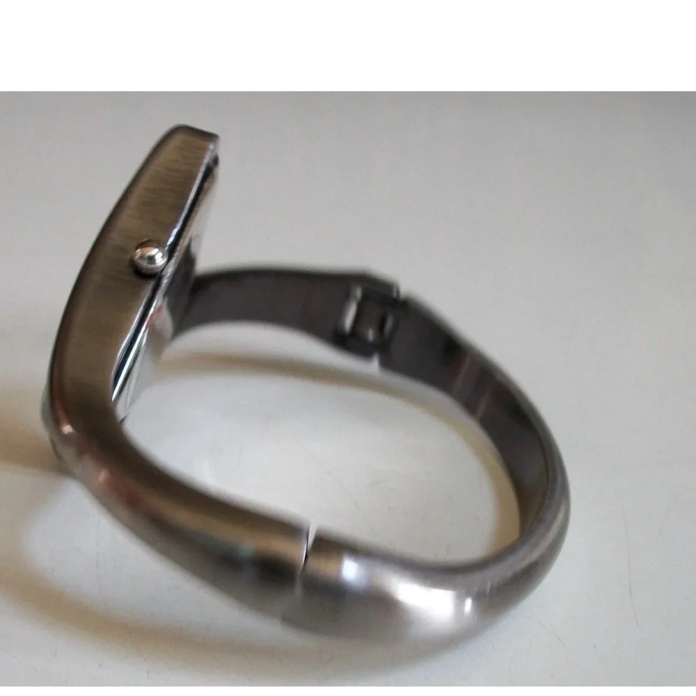 Women’s triangle hematite finish fashion bangle cuff casual watch